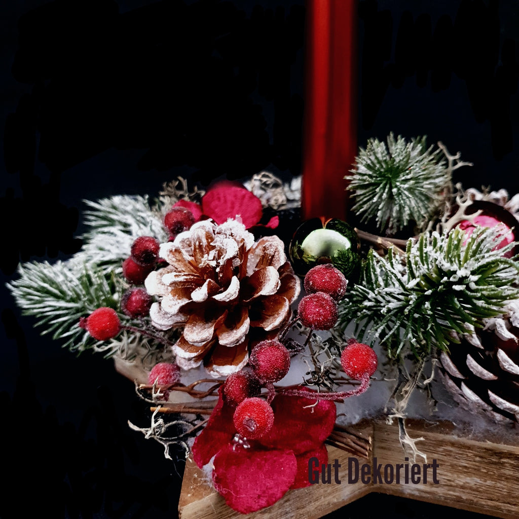 weihnachtsgesteck mit weihnachtsstern Weihnachtsstern Weihnachtsgesteck Kerze Zapfen rot